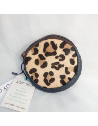 Monedero circular animal print azul...